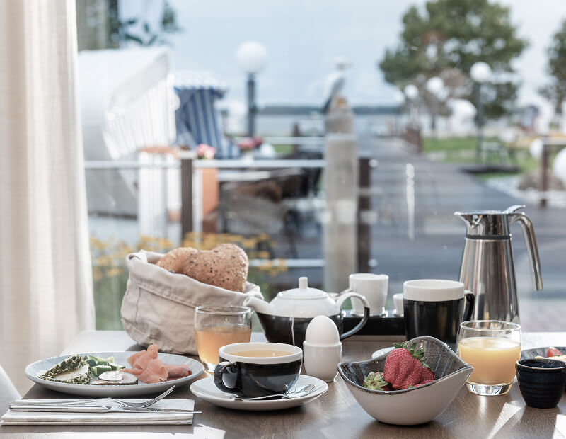 Breakfast table, richly laid with delicacies