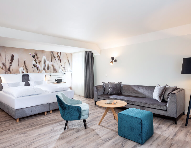 Cozy room with double bed and seating area