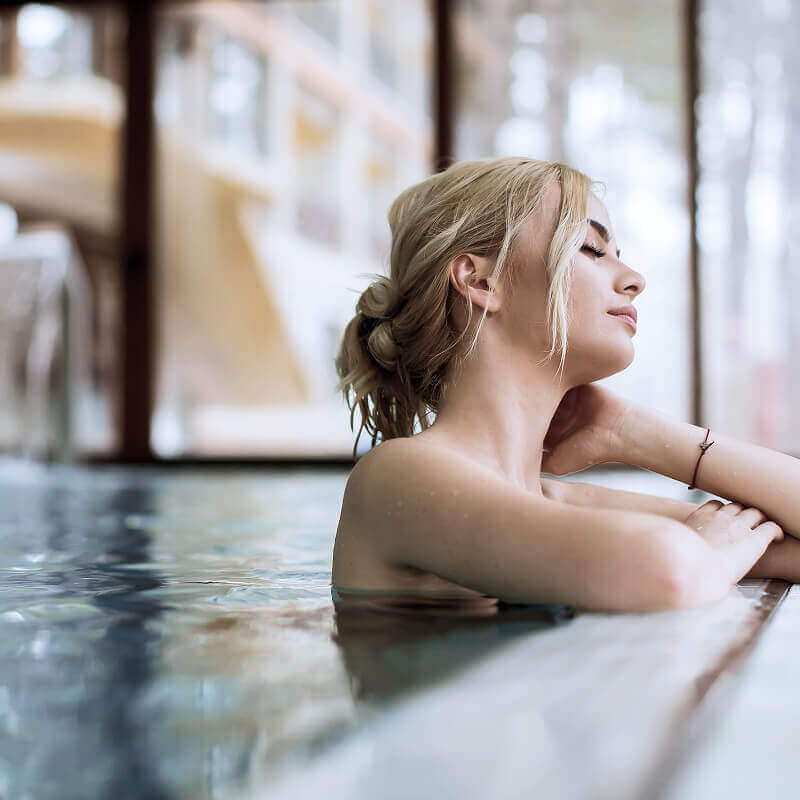 Woman relaxing in the pool